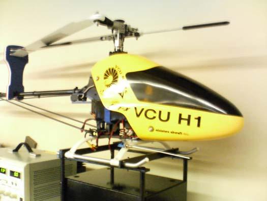 Figure 1: FQM-117B with stock wing The rotary-wing aircraft used is a Miniature Aircraft X-Cell Ion-X Electric Helicopter shown in Figure 1. The full frame is made from graphite.