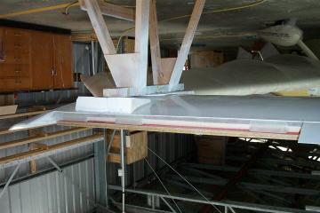 Aileron Reo s in Right hand wing positioned where Aileron hinges locate. 8. Insert Aileron Reo s into channel.