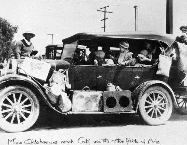 Family Packed In Car, On Way To The West Original caption: The automobile was often the only hope for the future to many families fleeing from the Dust Bowl in the Southwest during the depression