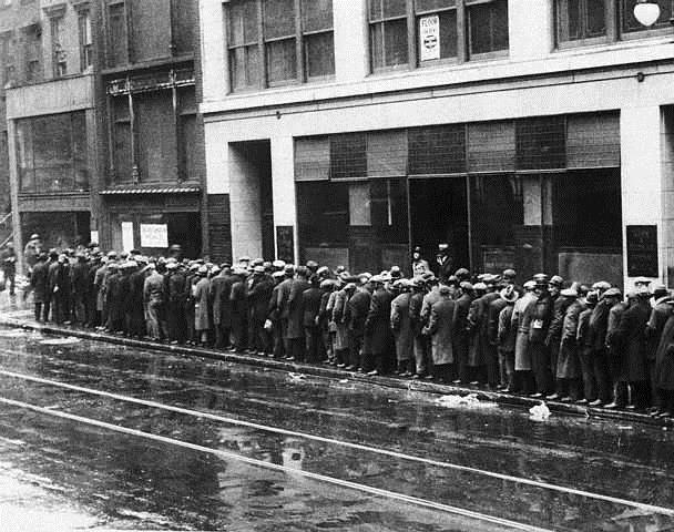 Unemployed Men in Bread Line Unemployed men wait in long