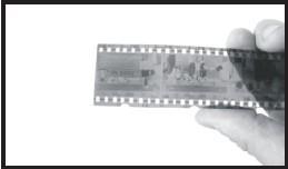 Loading Negatives (1) (2) 1. Hold the negative up to a light source.