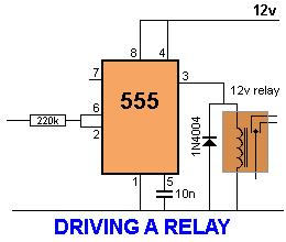 The relay can be connected "high" or "low" as show in the second diagram. One point to note: The input must be higher than 2/3V for the output to be low and below 1/3V for the output to be high.
