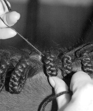 You ll have tied around the base of the braid, with the knot hiding under the braid. Pull firmly.