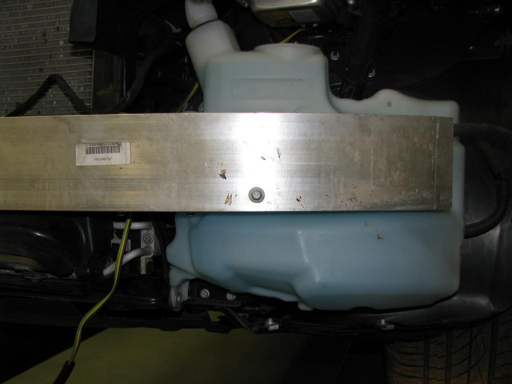 of the bumper using a T45 Torx. Set the bolts and bracket aside to be 9 10 10.