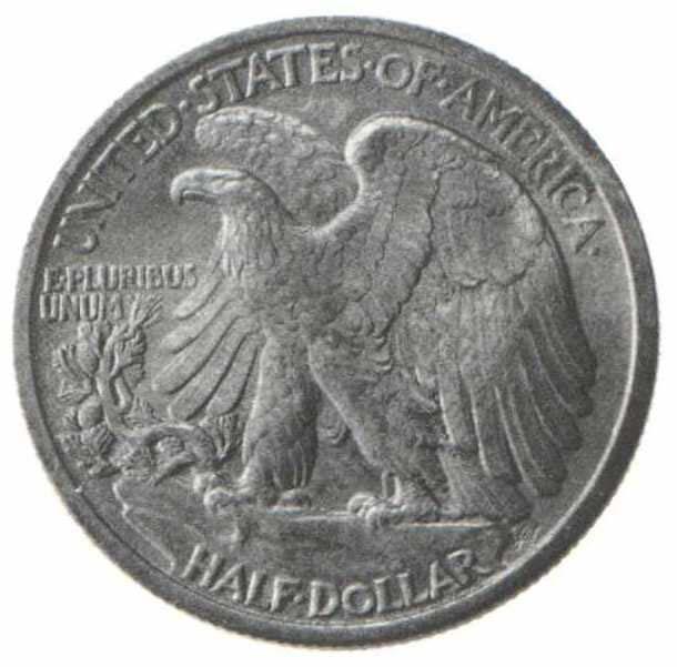 Reverse: The American Bald Eagle perched on a mountain ledge with a pine sapling (an early symbol of Young
