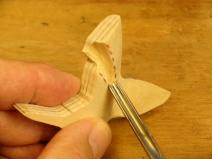 Use the knife and veiner until you have a realistic pair of wings. Make a recess in the back for the pin or magnet.