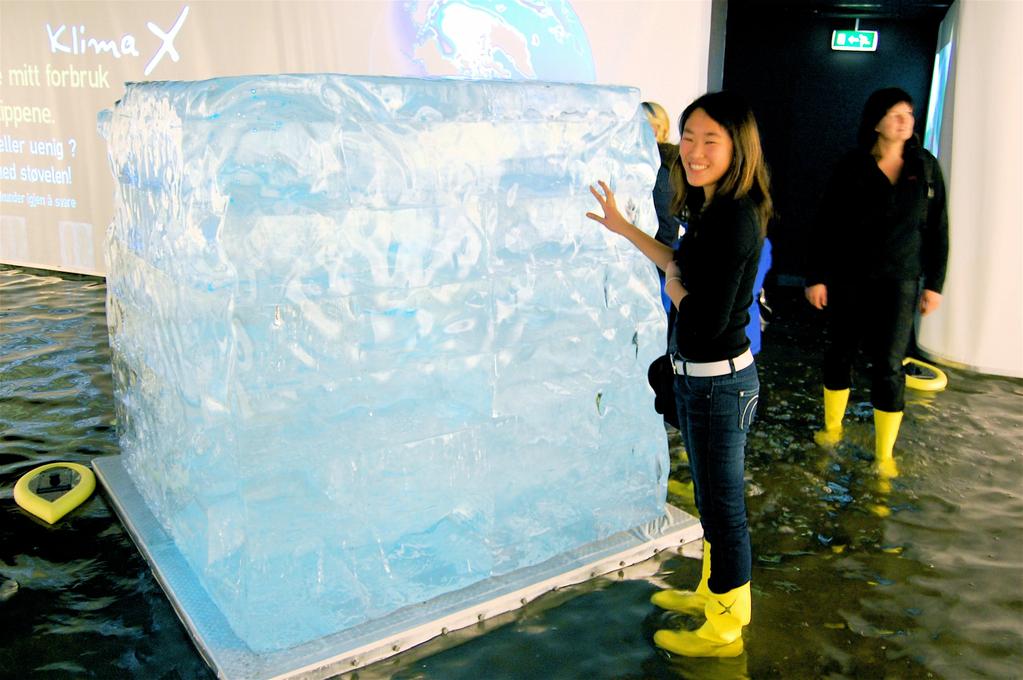 Two enormous melting ice cubes symbolise the melting of the Arctic ice cap.