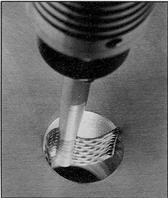 As the part rotates, the portion of the hole that is subjected to the direct impingement of the blast stream at each nozzle location moves 90E for each 90E rotation of the part.