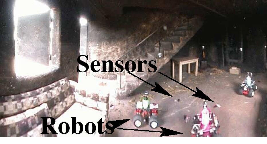 Figure 1: (Left) An ad-hoc network of robots and Mote sensors deployed in a burning building at the Allegheny Fire Academy, Aug 23, 2002 (from an experimental exercise involving CMU, Dartmouth, and U.