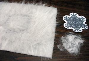 Embroidering on Faux Fur Preparation: The fur on the area to be embroidered should be no longer than 1/4 inch. If yours is shaggier than that, you'll need to give it a little trim.