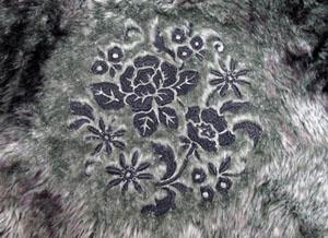 embroidery on faux fur - a winter handwarmer, a lined hood on a winter coat,