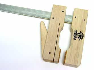 Cam clamp White glue, epoxy, CA glue, double-faced tape Clamps Cam clamps: All-wood cam clamps, such as the one shown above, are extremely popular among guitarbuilders.