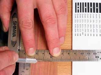 All fret distances are measured from the front of the nut Marking the fret positions Fret distances for a scale length of 22.5 (571.