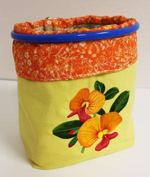Put an embroidered catchall organizer anywhere you need a colorful, crafty container to keep items handy where you need them most!