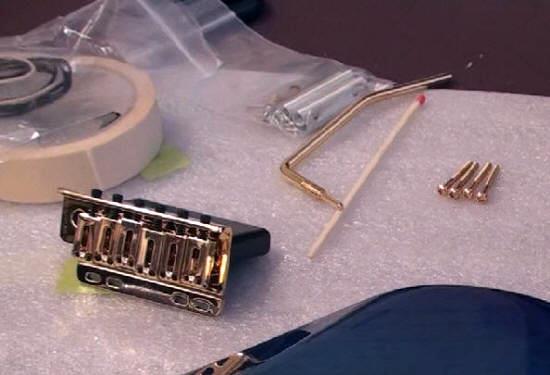 As stated the tremolo arm is a modified design of the original, the thin bit being a guide in to the trem hole as