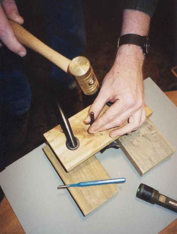 H&R/NEF Handi-Rifle Trigger Work Pg. 7 Make this sandwich; padded benchtop, two 8" 2 x 4 wood blocks with a three-inch gap between them, your frame (right side up!