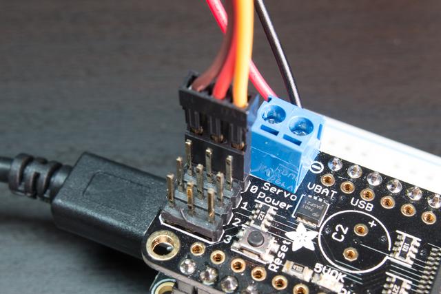 your servo's datasheet to be sure, but typically the brown wire is connected to ground, the red wire is connected to 5V power, and the yellow pin is connected to PWM: Be sure you've turned on or
