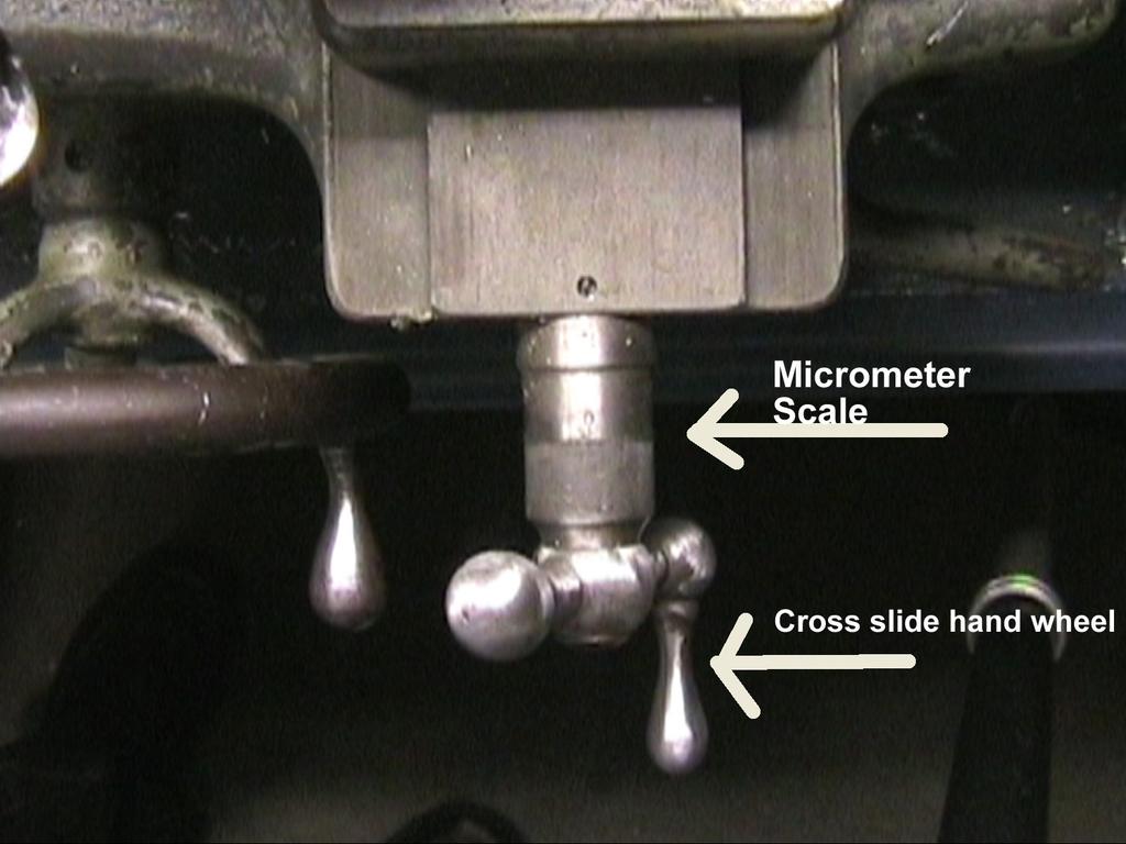 The micrometer scale allows the operator to control the amount of material removed.