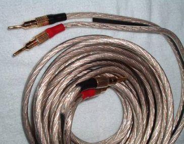 Guitar cord with a straight phone plug and a right-angle phone plug. Speaker cable: This cable connects a power amplifier to loudspeakers.