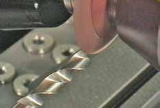 S., STI regrind give after probing drill lip contour me 5,000-7,000 inches.