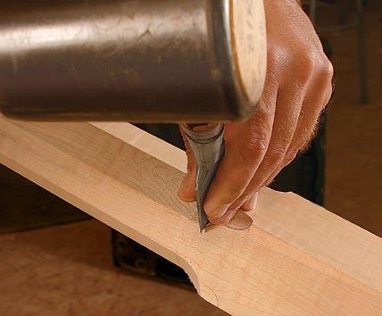 longer than the headboard width to allow for seasonal expansion. For accuracy, I use a hollow-chisel mortiser to chop the mortises, staying clear of the layout lines.