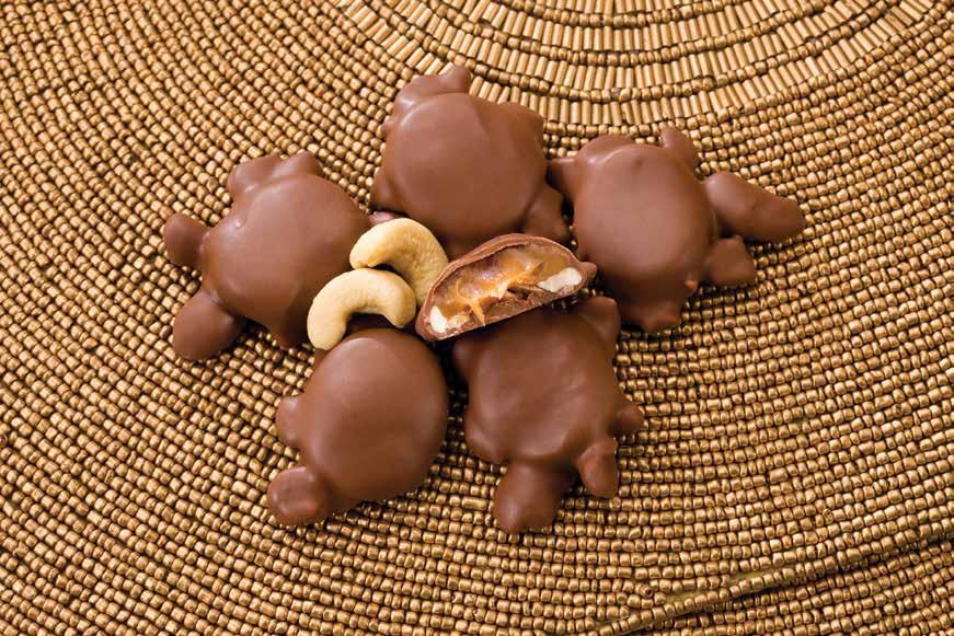 chocolate and crunchy almonds are blended in small batches and poured with care. 7 oz.