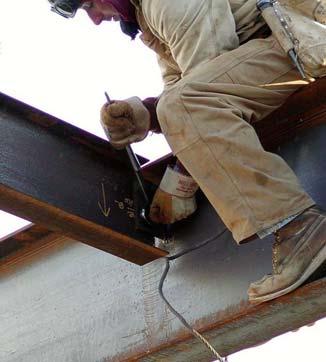 of an ironworker using an ordinary spud wrench to bring the connected plies into firm contact (RCSC 2000) 14 Turn of Nut Installation Introduction of Fasteners When high strength bolts are to be