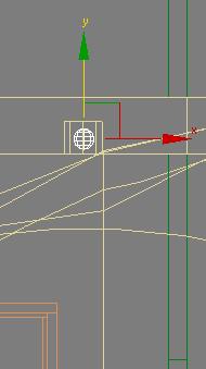 7 Right-click the Front viewport, zoom in to the light fixture socket, and use the Select And Move tool to move the light object on its Y axis until it is