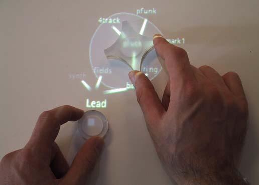 and the Audiopad is that the reactable uses modular synthesis, while the Audiopad uses loop-based synthesis.