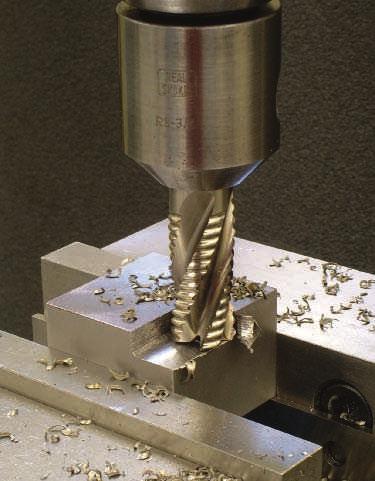 (See Figure 6.3.69.) FIGURE 6.3.70 Touching off with a roughing endmill to set a reference for step width. Move the X-axis so the endmill is about 1/4" away from the workpiece.