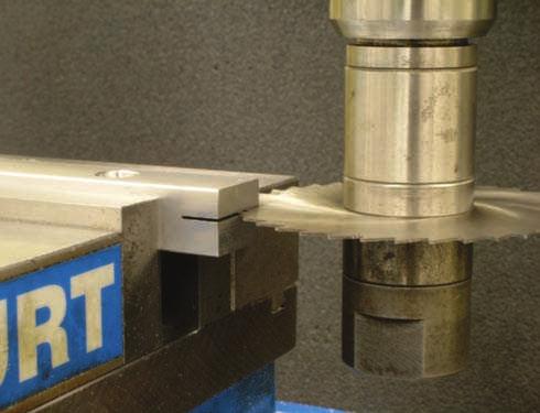 They can be positioned using the same method used for positioning woodruff keyseat cutters by touching off the top of the
