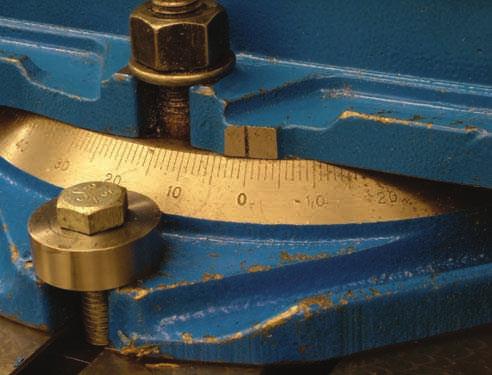 This will roughly align the solid jaw with the table movement. (See Figure 6.3.8.) Mount a dial indicator in the machine spindle or on the head or ram using a clamp or magnetic base.