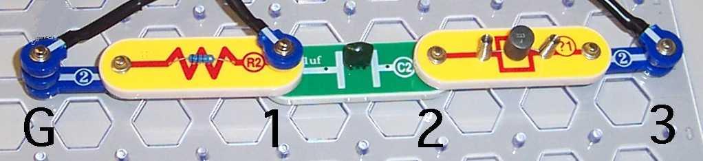 Examine the photo below.. The connection points on the SnapCircuit board have been labeled, from left to right G, 1, 2, 3.