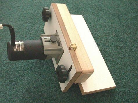 Flush Trimmer Jig By Santanu Lahiri I found this jig in a book published by the Fine Woodworking people: Ingenious Jigs And Shop Accessories, publisher Taunton Press, ISBN# 1-56158-296-4.