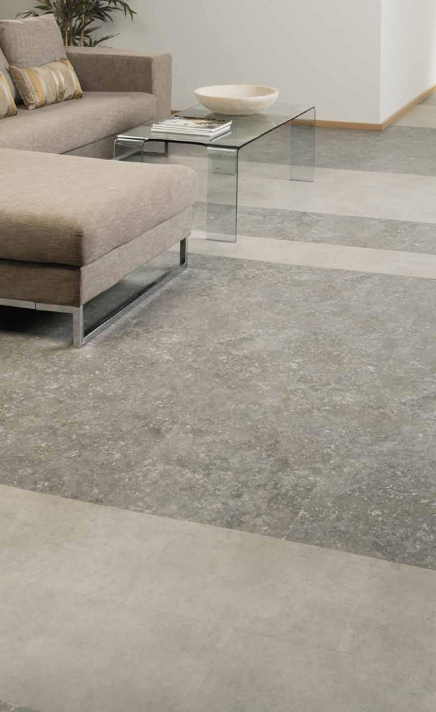 STONE DRY STONE SIENNA Organic surface design with an earthy, embossed mottling.