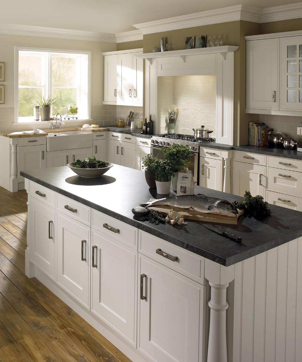 natural buttermilk finish, this country-styled kitchen complements the traditional home