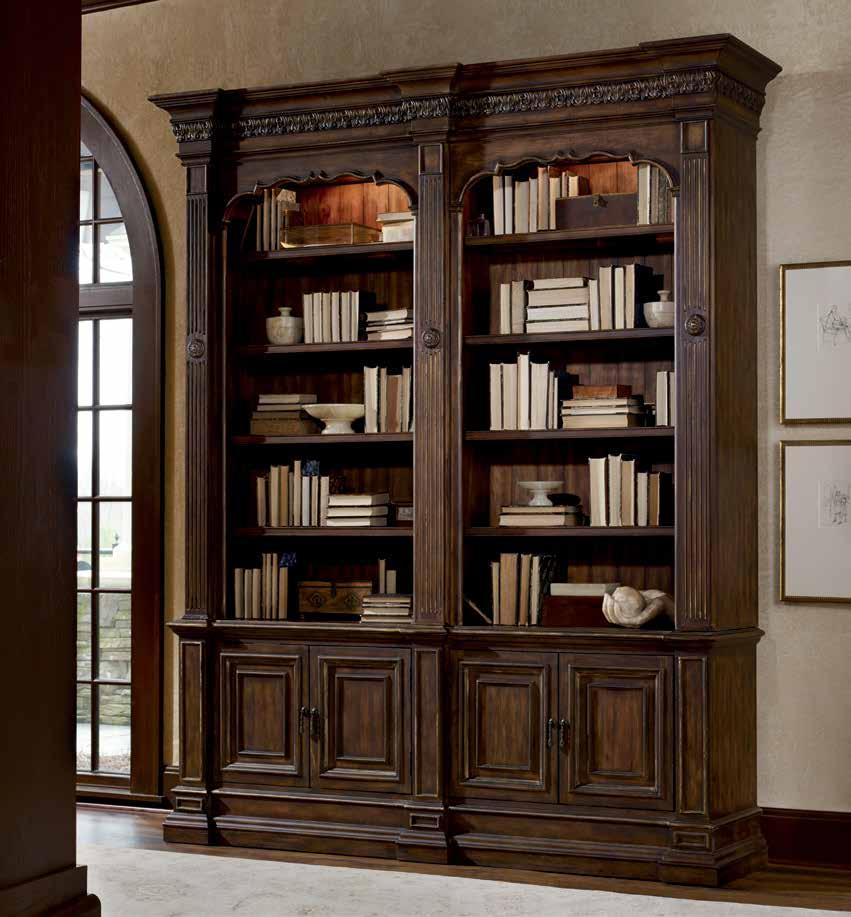 double bookcase and writing desk with graceful scroll legs.