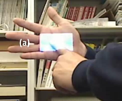 Chapter 2. Visual Interface on Palm 28 Figure 2.7: Image projected region (a) on palm. virtual screen and the relative location at the region should be tracked.