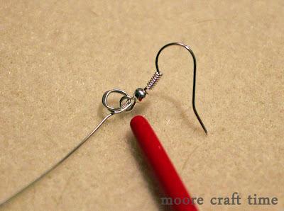 Supplies: 2 8 pieces of heavy gauge wire 2 earring hooks 2 crystal beads small pliers (round-nose are best,