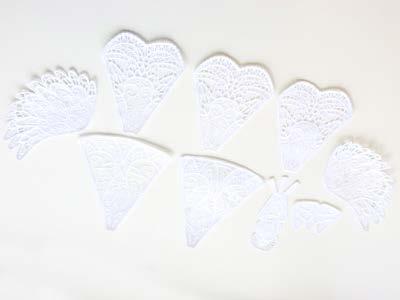 Repeat the previous steps to prepare and embroider the other lace organza pieces.
