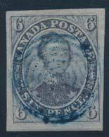 ... Unitrade $6,400 3 #1 1851 3d red Beaver on Laid Paper, used with neat target cancel and four nice margins.