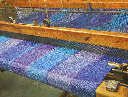 Making Cloth Machines can also make yarn into cloth. A special dye is used to make the yarn colorful.