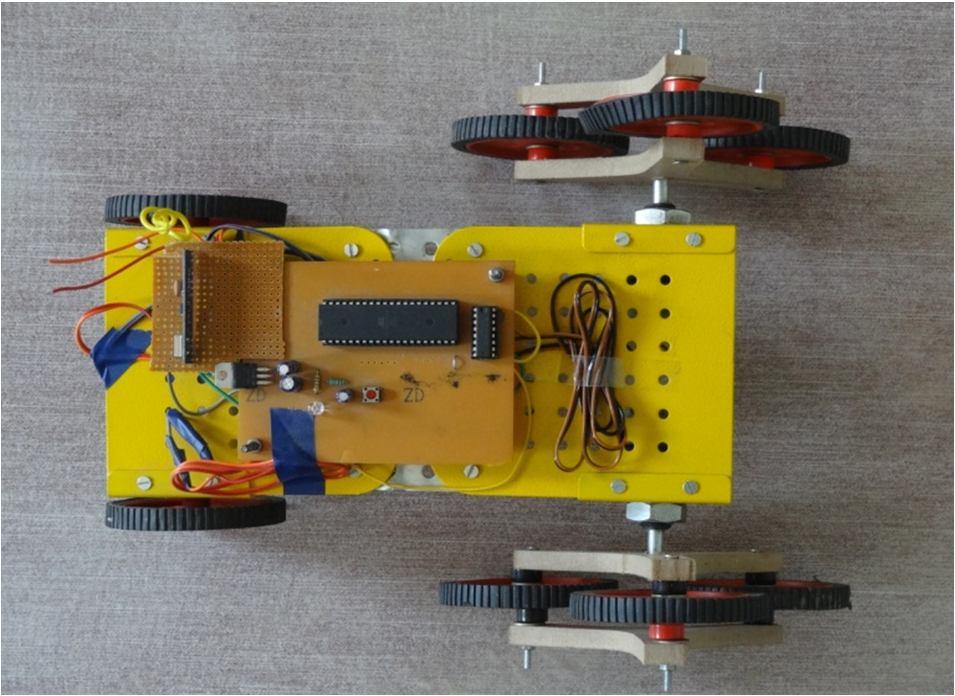 two 60 RPM DC motors are connected to the front wheels whereas two BO motors are connected to rear wheels. Circuit board is mounted on the upper portion of the robot. Fig.