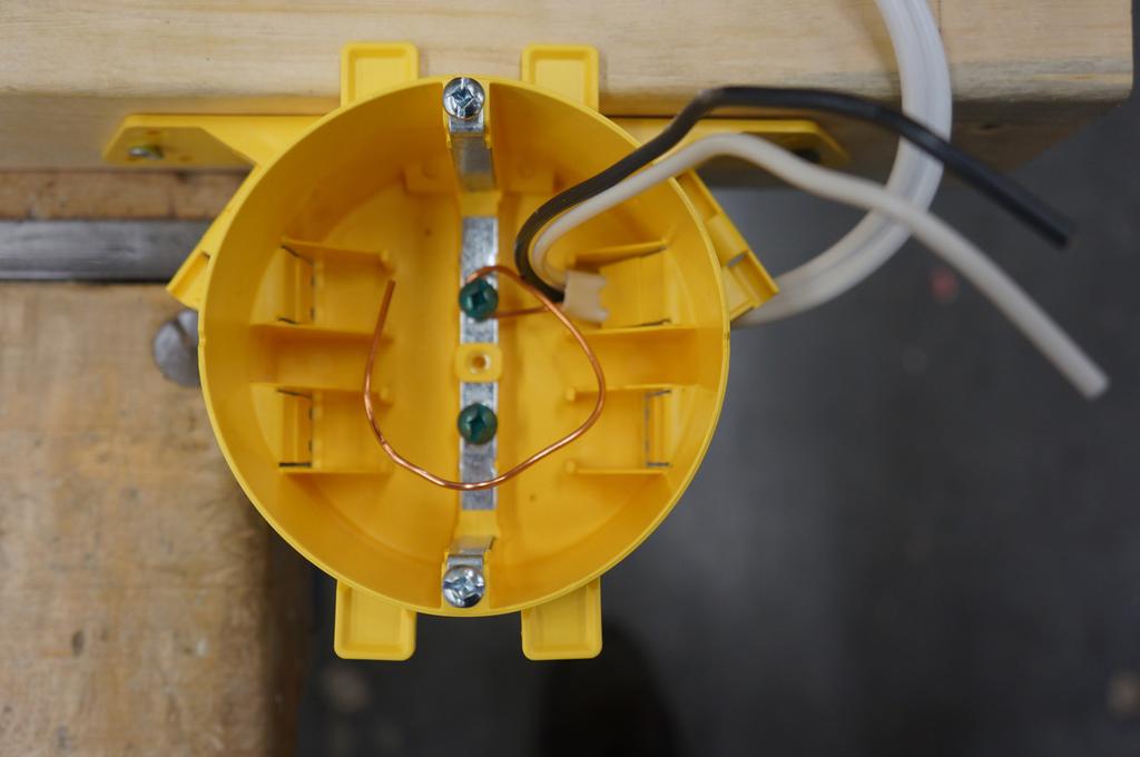 Note: The switch will be bonded to the ground when the device is secured to the box. Figure 15 Switch box grounding 6.