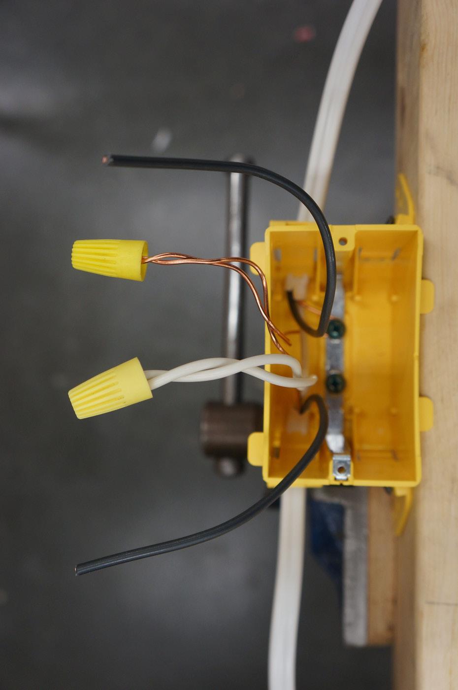 Electrician Switch Box 1. Cut, strip, and twist the two white conductors and join with a wire connector in the switch box (Figure 18).