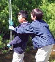 Students participate in the Office of National Marine Sanctuaries Ocean for Life education program in summer 2009 (top). Students work together to monitor water quality in a local watershed (middle).