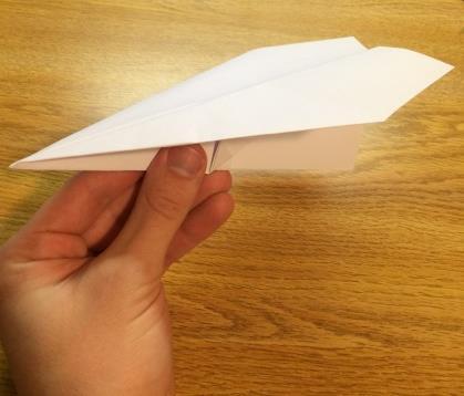 Repeat step 9, except on the other side of the paper airplane 11.