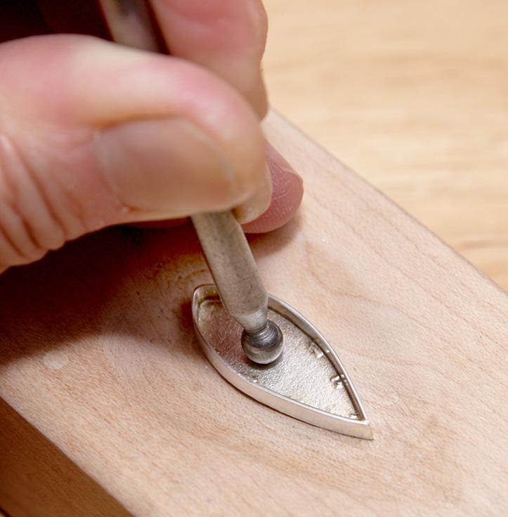 Use a ring mandrel and a rawhide hammer to shape the ring into a perfect circle with an outside diameter of approximately 5 8 in. (16 mm). Stem Shape the stem.