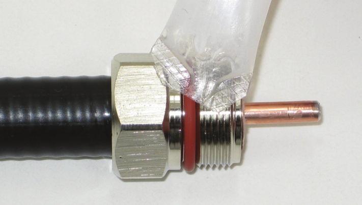 Install the connector clamp to the cable; screw clockwise until the connector