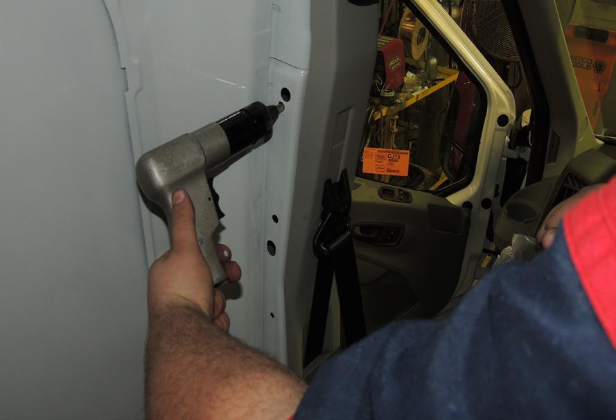 collar to drill pilot holes through the van